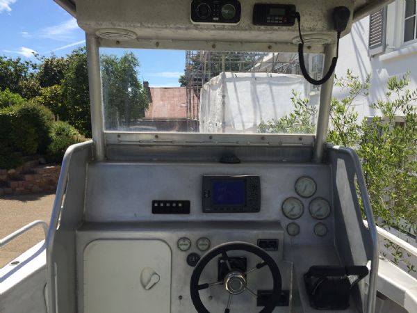 Boat Details – Ribs For Sale - Used Aluminium 7.0m Work Boat with Twin Evinrude 75HP Outboard Engines and Roller Trailer