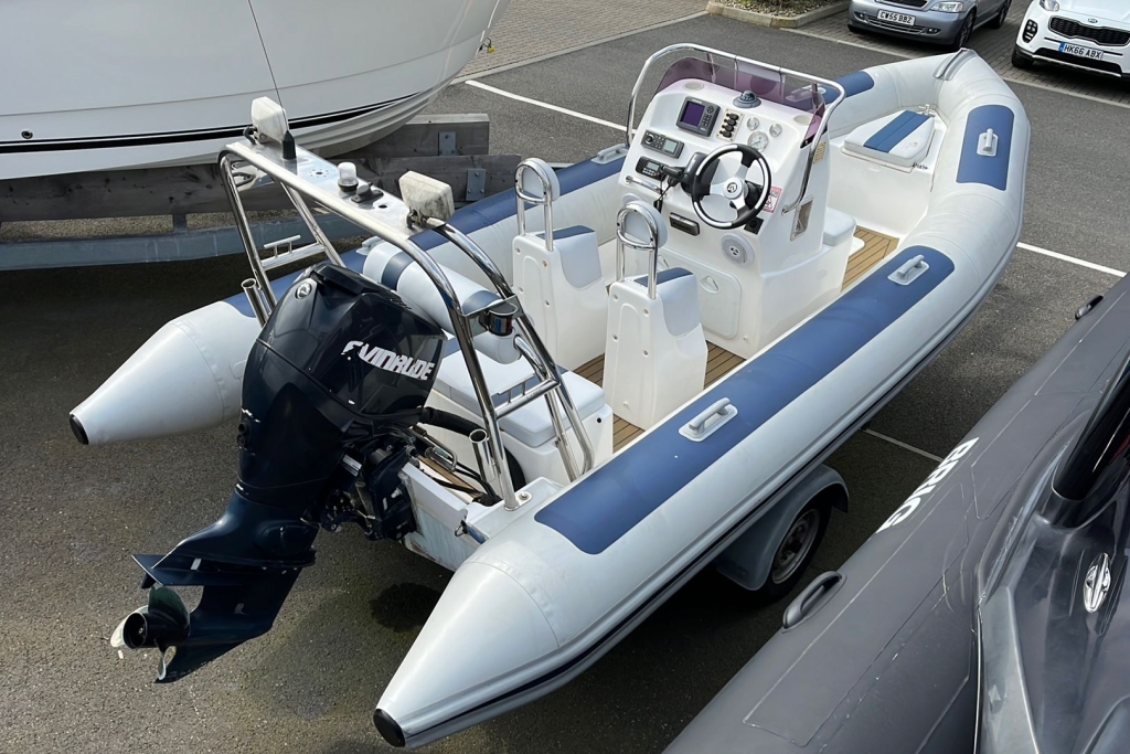 2009 Ballistic RIB 5.5 Evinrude ETEC 90 Indespension single axle trailer