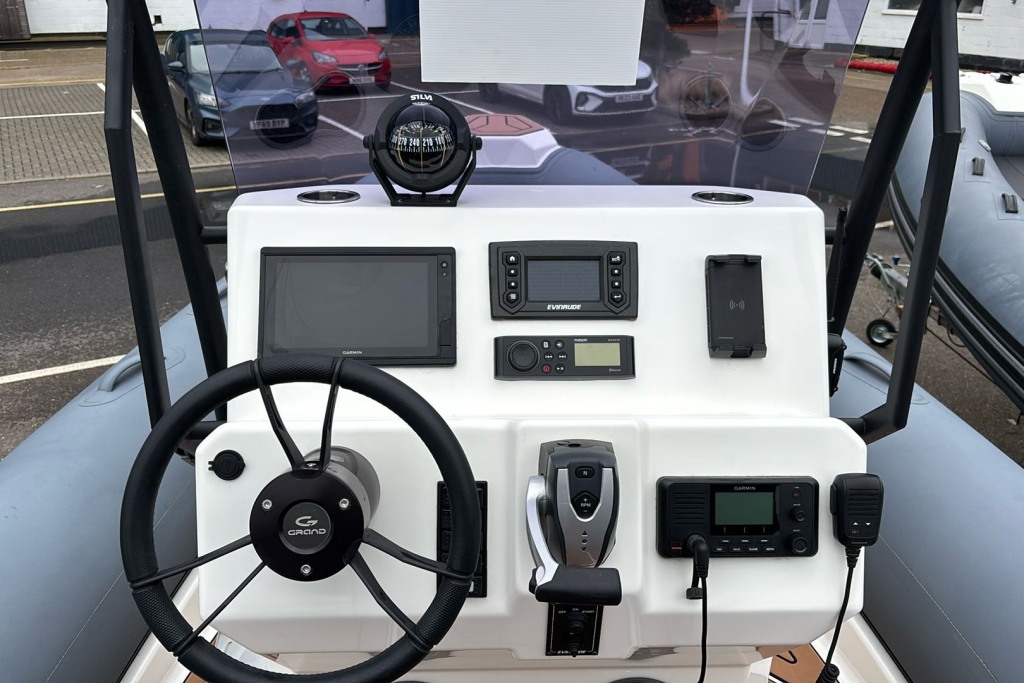 2021 Grand D600 Active Evinrude G2 140 Drive-by-wire. Admiral single axle roller trialer.